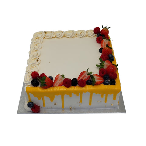 Mango Drip With Berries Cake